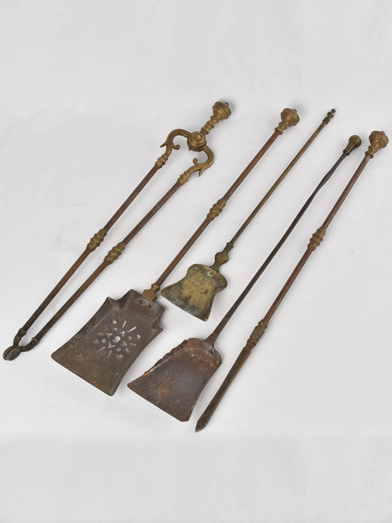 Brass and steel fireplace utensils