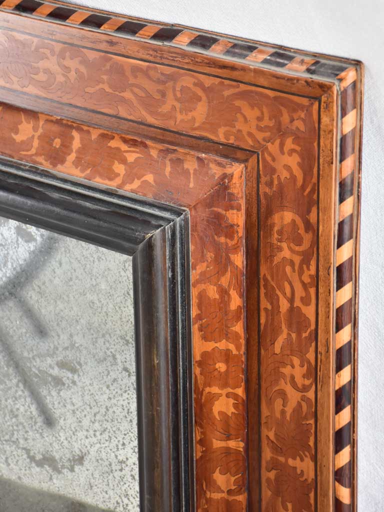 Aged marquetry framed Languedoc mirror