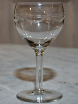 Six crystal wine glasses in the Louis XV style