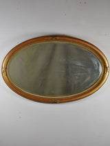 Early twentieth-century oval French mirror with bronzed glass 34¼" x 21¾"