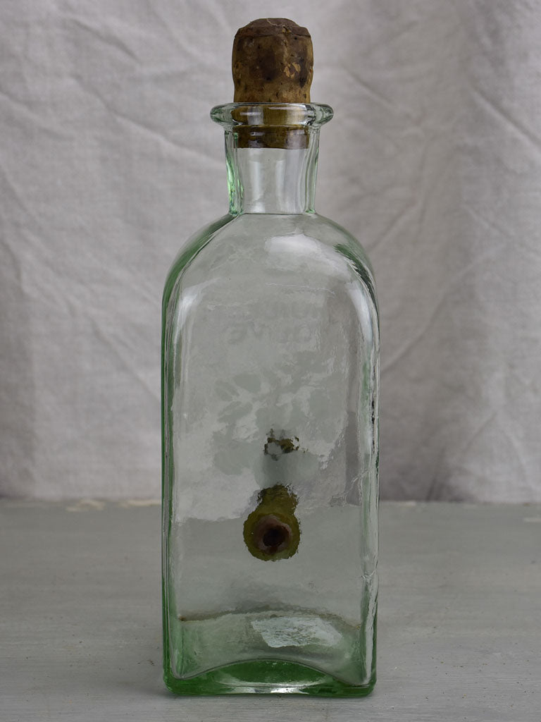 Vintage olive oil dispensing bottle