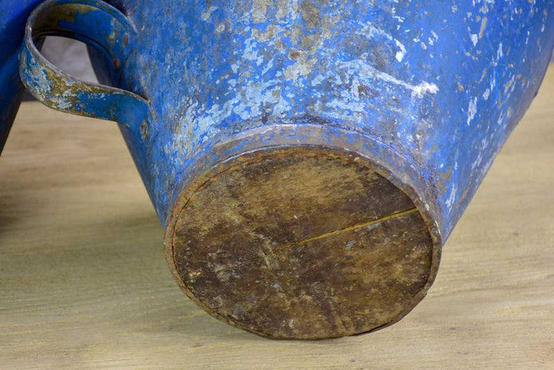 Pair of rustic blue agricultural vessels 20"