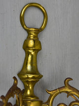 Brass appliques with consistent patina