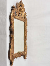 Unique gilded Louis XV style mirror