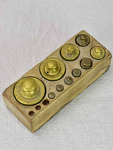 Old-fashioned bronze weight measuring scale
