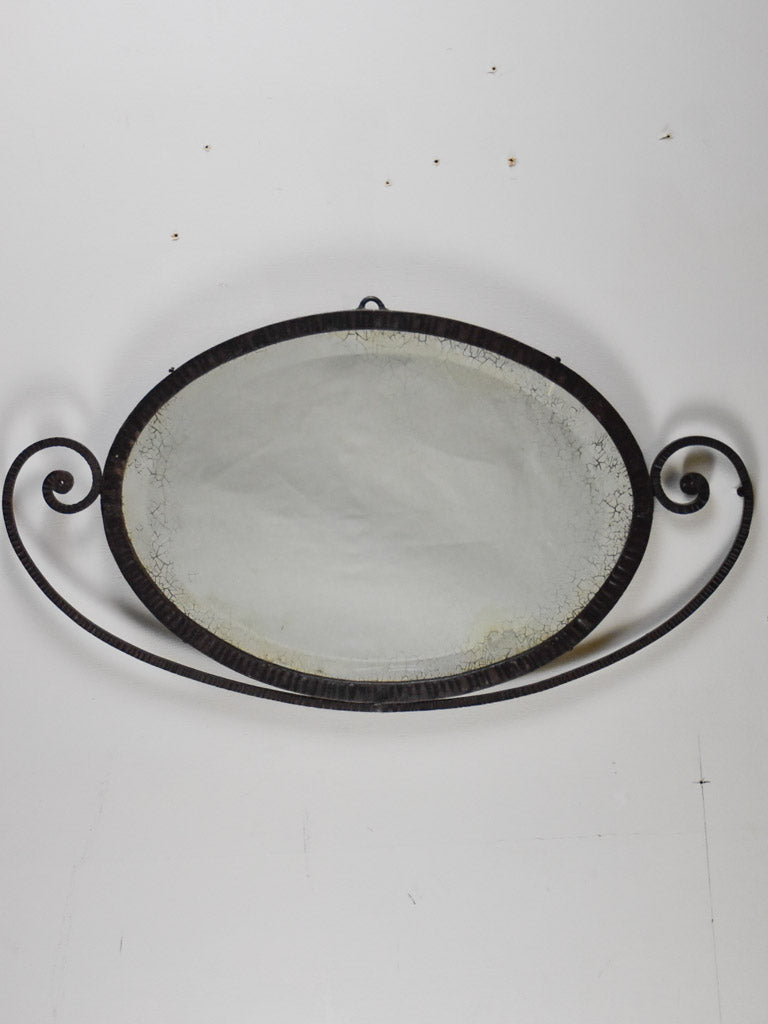 Small Art Deco oval mirror with wrought iron frame 12½" x 22¾"