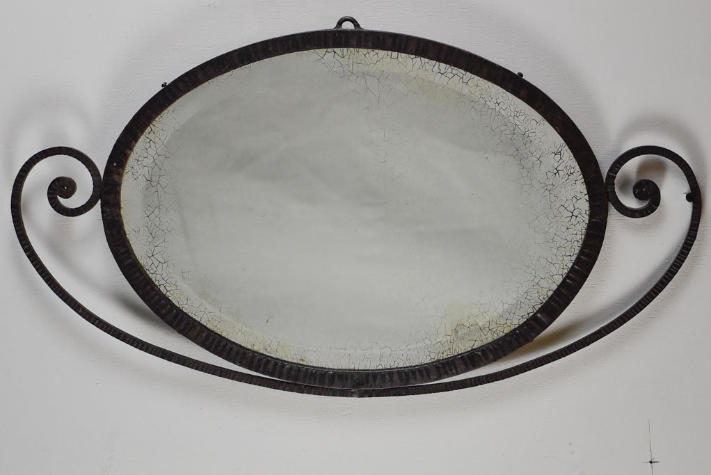Small Art Deco oval mirror with wrought iron frame 12½" x 22¾"