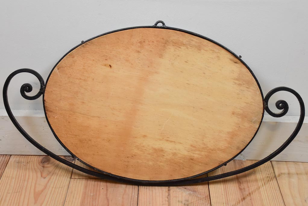 Small Art Deco oval mirror with wrought iron frame 12½" x 22¾"