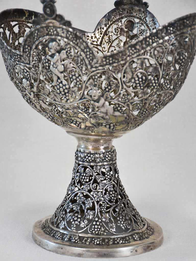 Cherub embellished solid silver basket