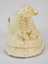 Rustic earth-toned sheep coin repository