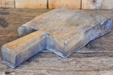 Very thick antique French cutting board with long handle