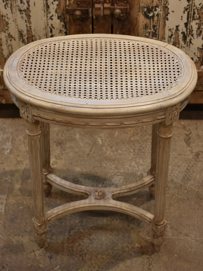Antique Louis XVI side table with rattan top