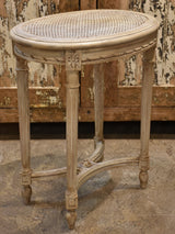 Antique Louis XVI side table with rattan top