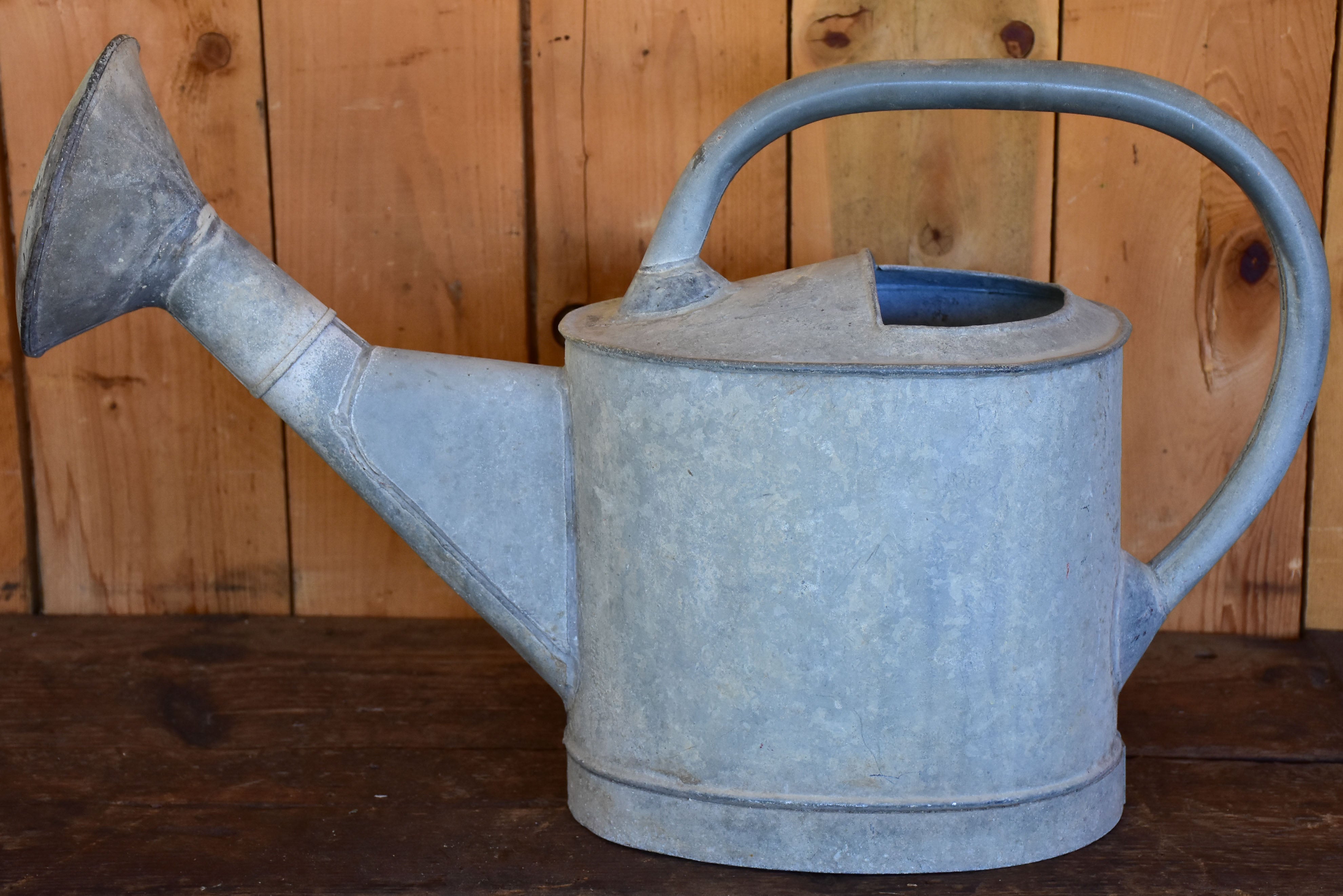 Vintage French watering can with large rose