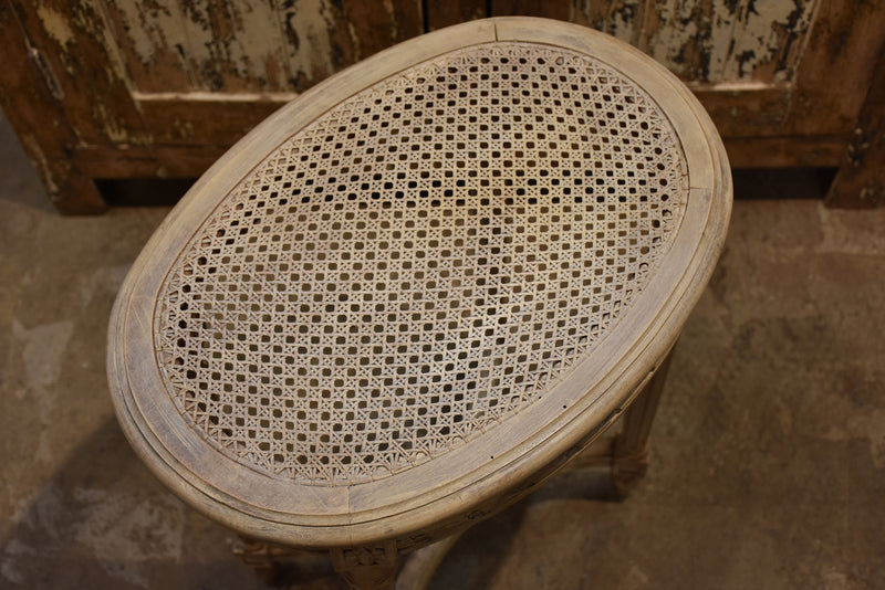 Antique Louis XVI side table with rattan top