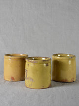 Three antique French yellow ware preserving jars 4"