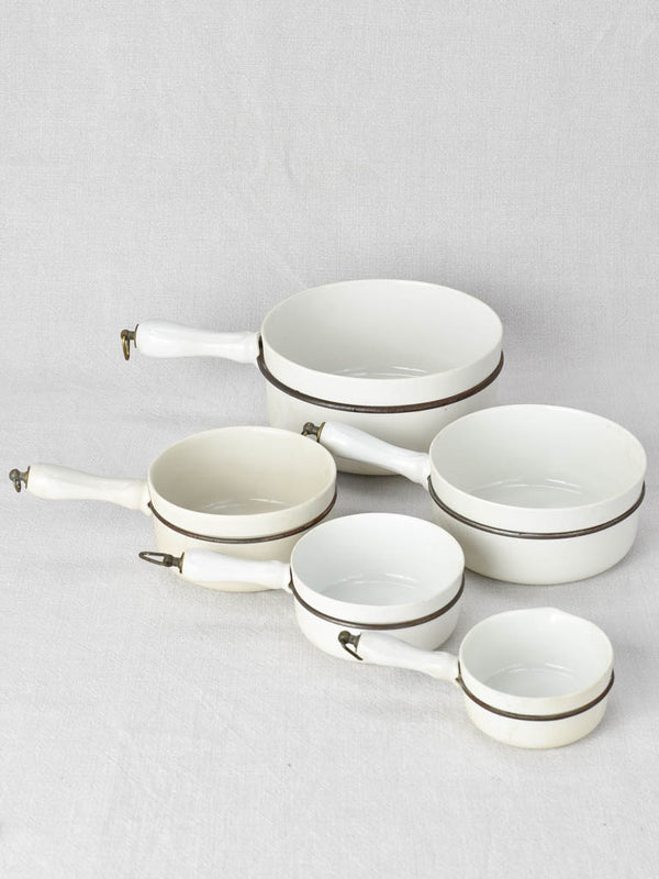 Set of 5 porcelain saucepans branded Cellinite CDV