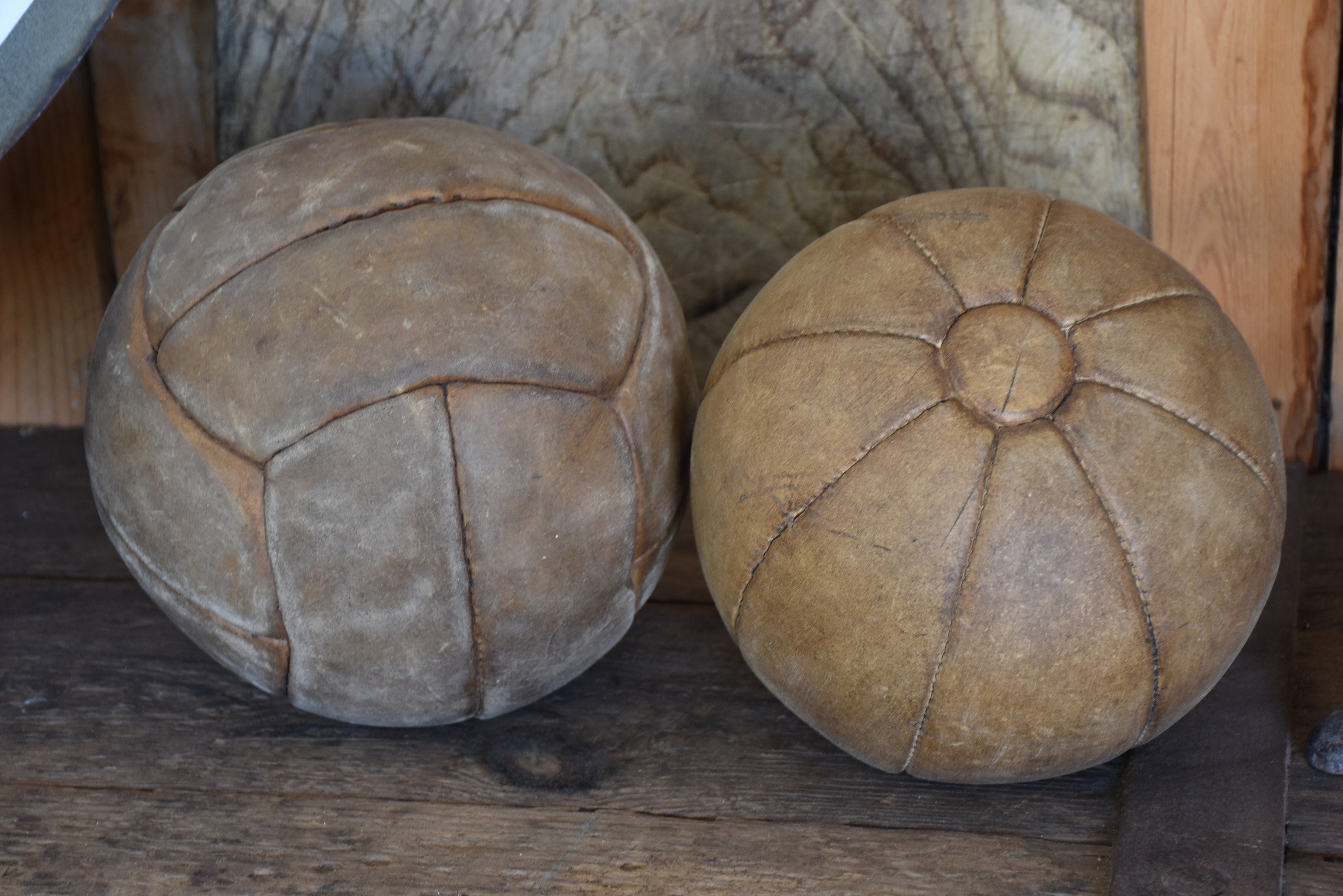 Two antique French medicine balls