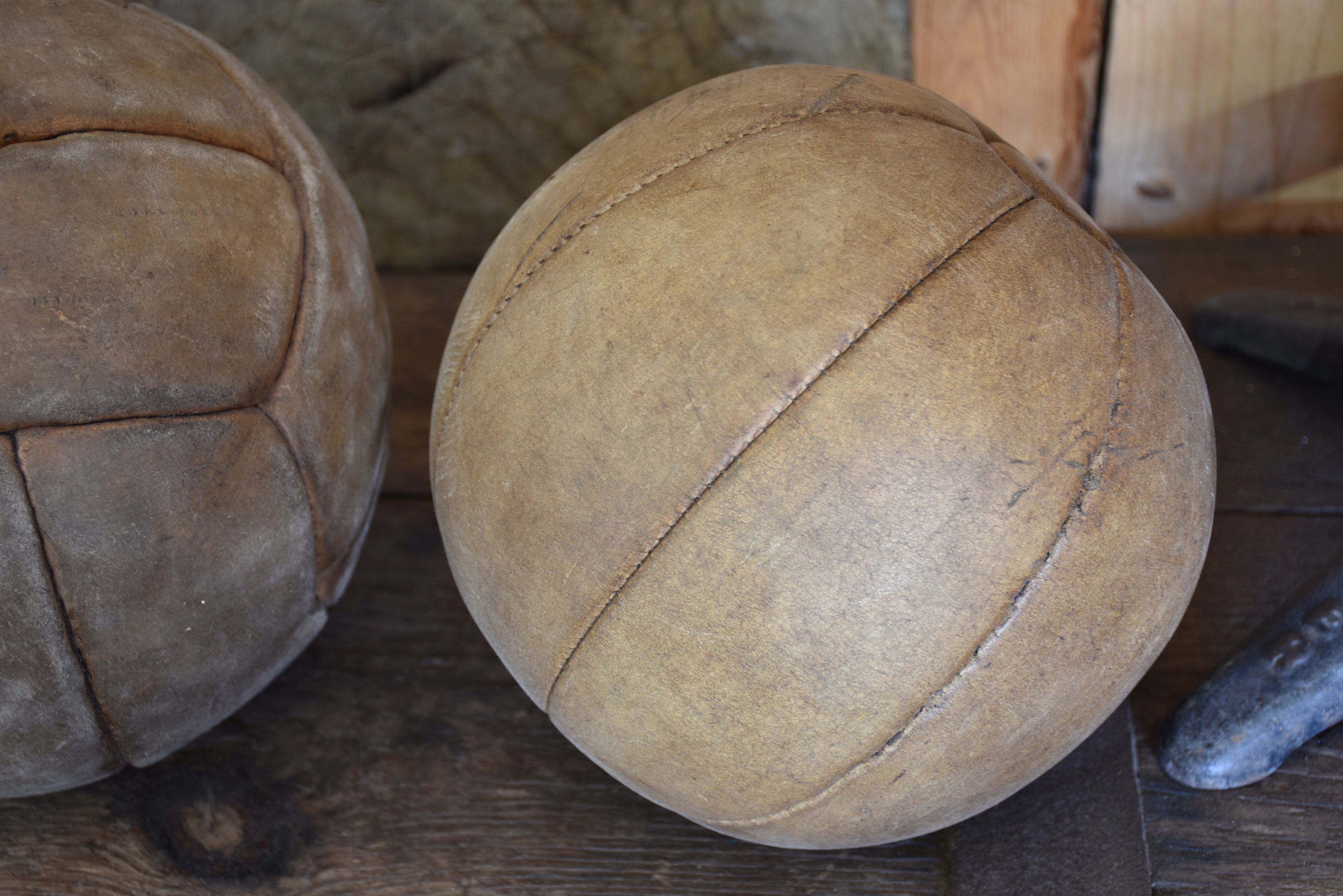 Two antique French medicine balls