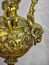 Bronze Napoleon III pitcher adorned with foliage, fruit and a cherub 17¾"