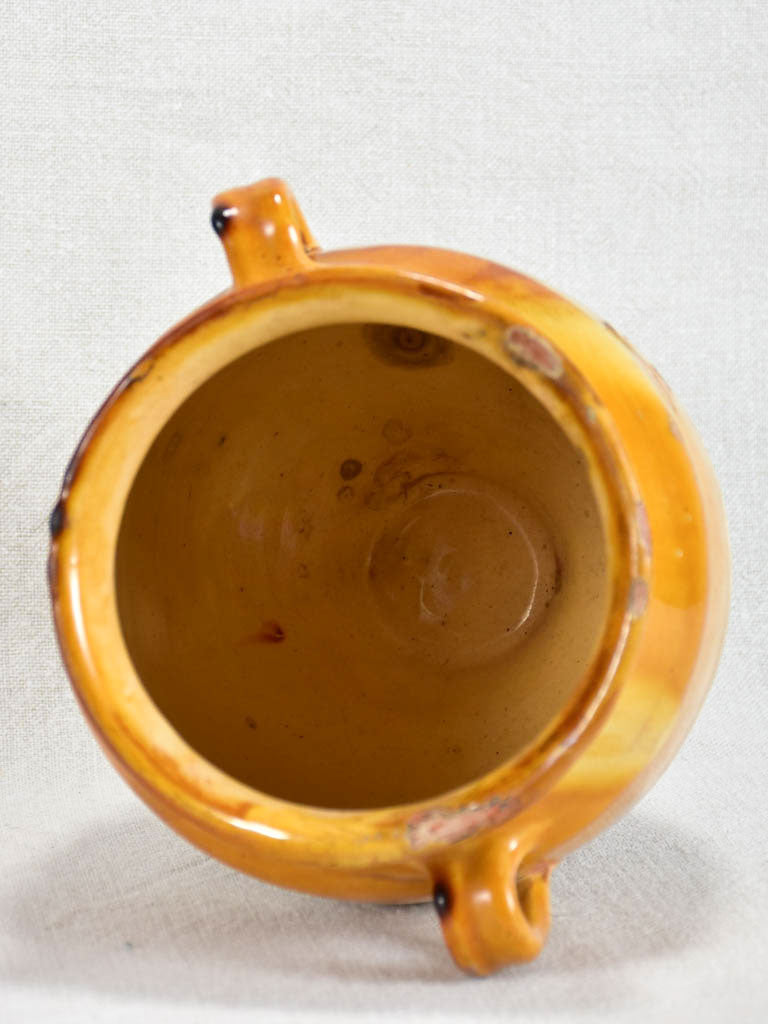 Small antique French confit pot with yellow / orange glaze 7"