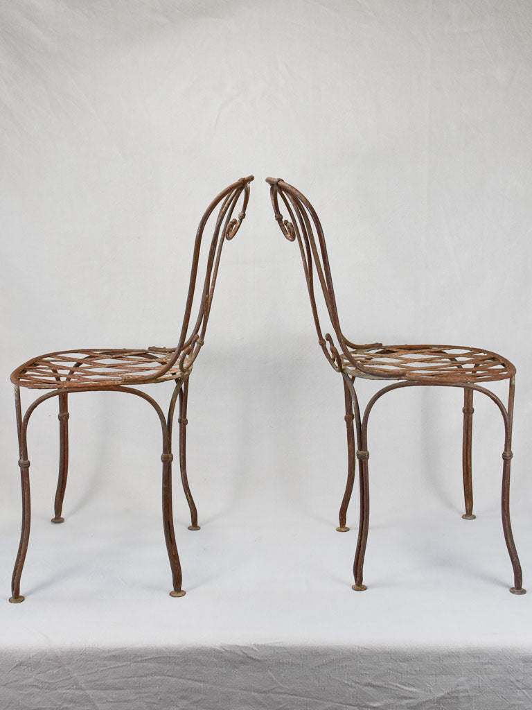 Pair of 19th century wrought iron garden chairs
