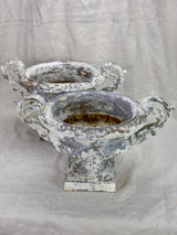 Pair of antique French Medici urns with large handles and white patina
