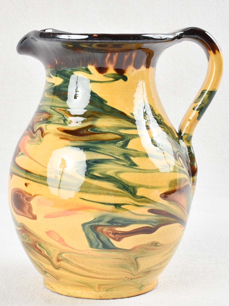 Vintage terracotta pitcher with colorful glaze 8¾"