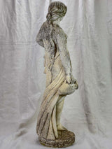 French sculpture of a draped lady collecting water 35"