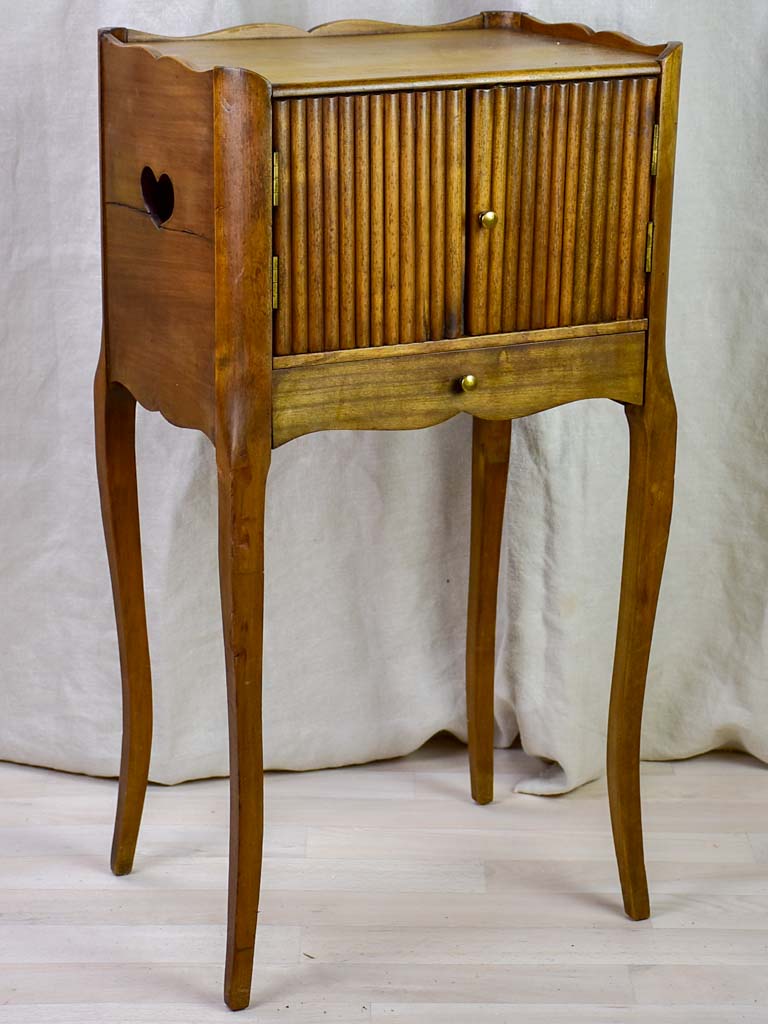 Antique French nightstand with ribbed doors and heart shaped cut out