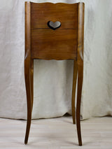 Antique French nightstand with ribbed doors and heart shaped cut out