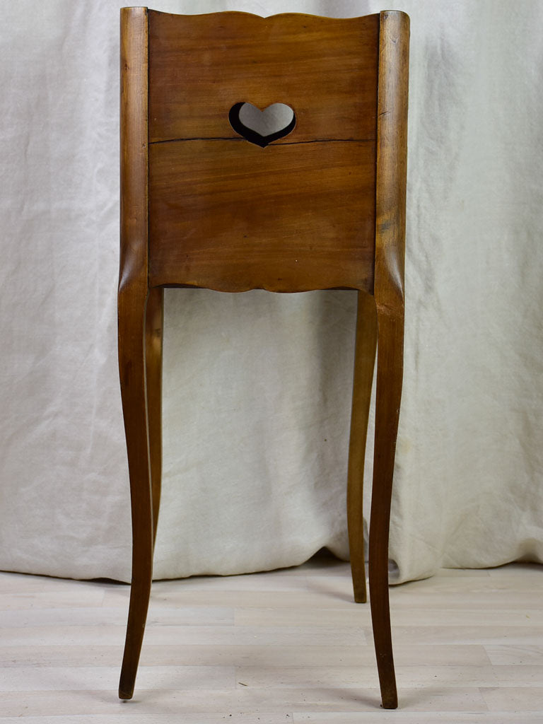 Antique French nightstand with ribbed doors and heart shaped cut out
