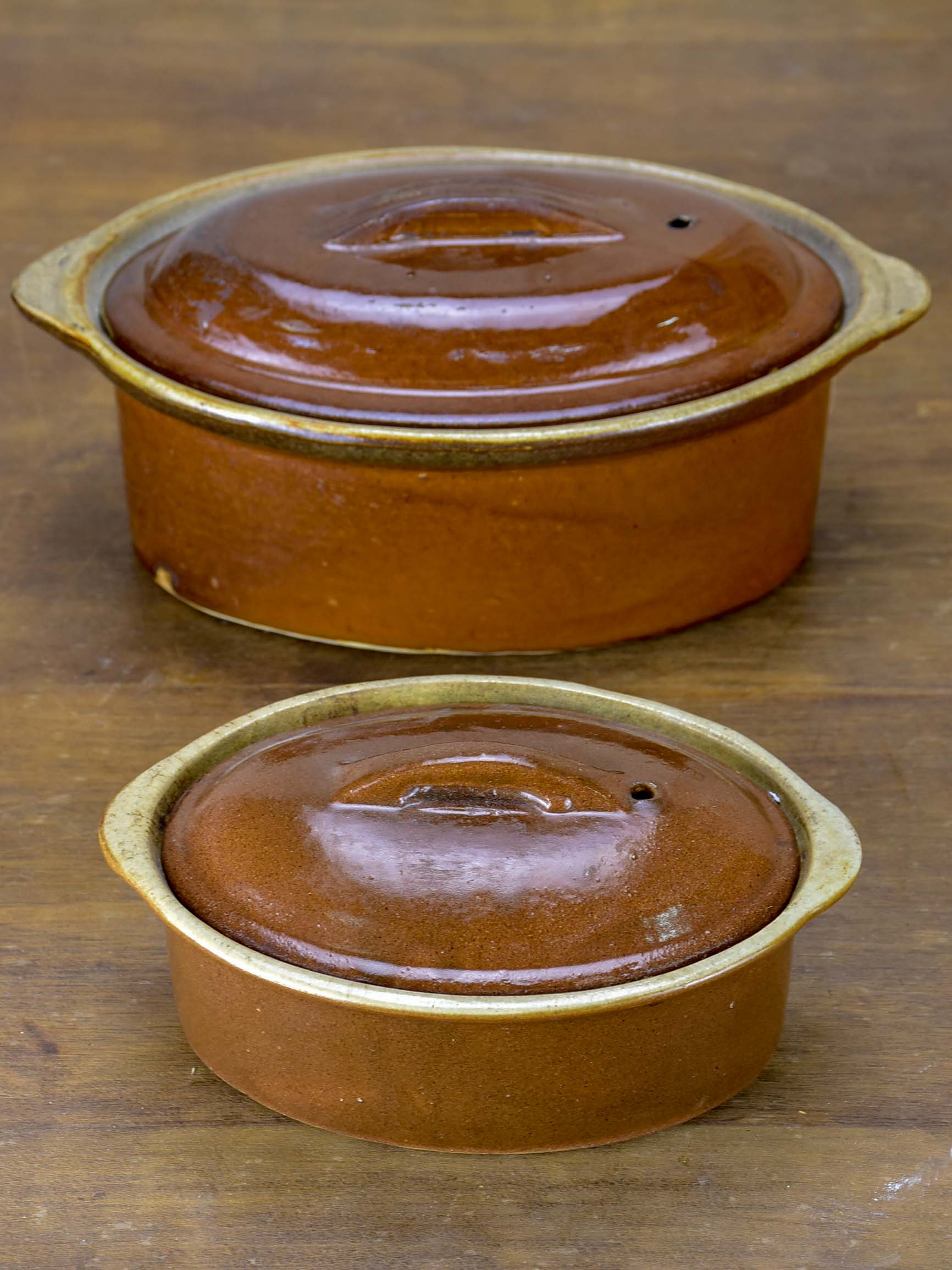 Two late 19th Century French tureens with brown glaze