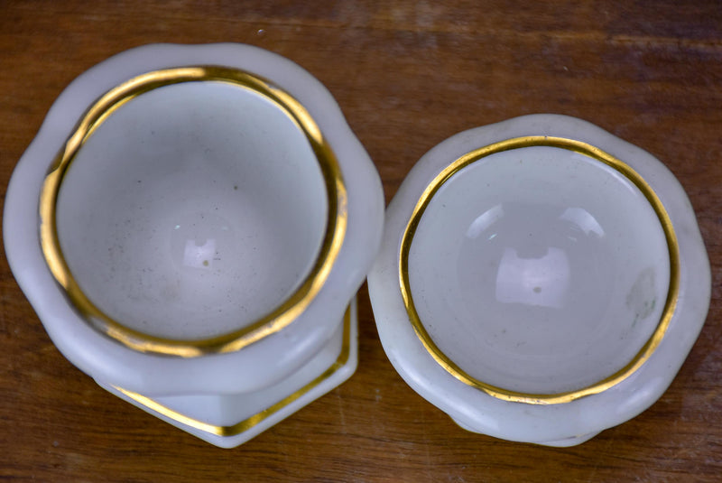 Antique French Limoges egg cups on a platter