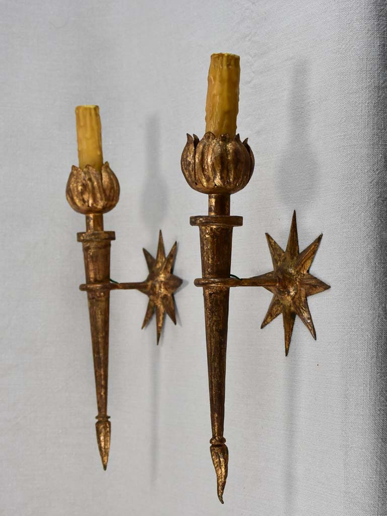 Pair of mid-century wall sconces with star motifs 17"