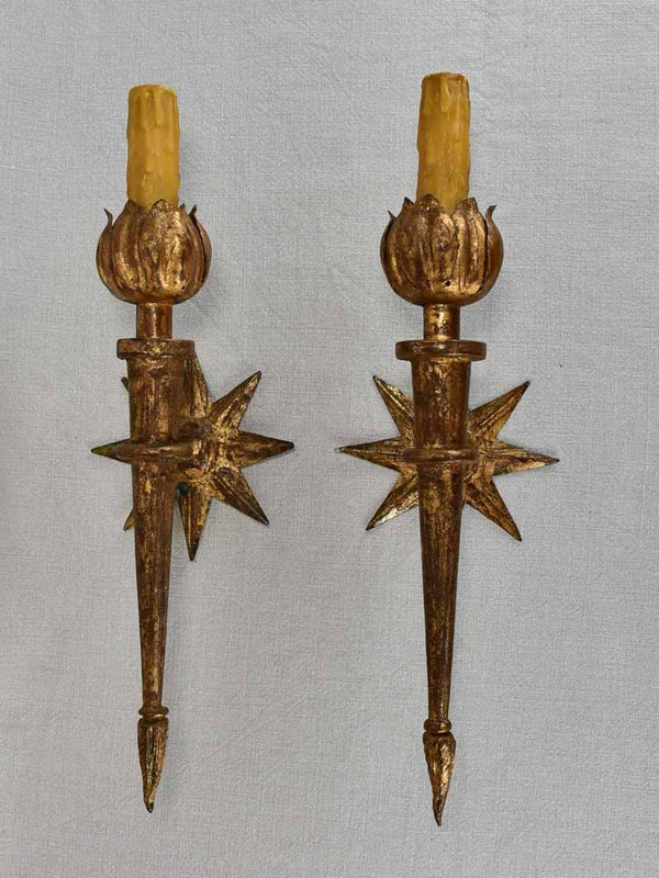 Pair of mid-century wall sconces with star motifs 17"