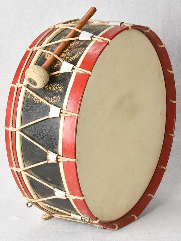 Antique festive Belgian drum with stick