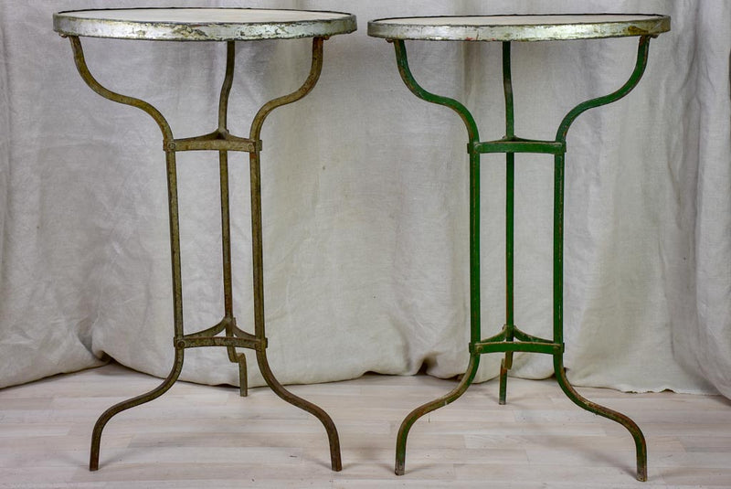 Pair of antique French marble top bistro tables