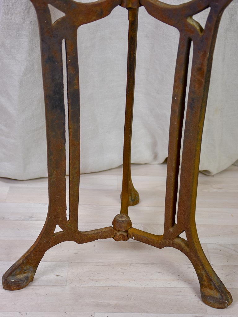 Antique French bistro table with marble top and cast iron base