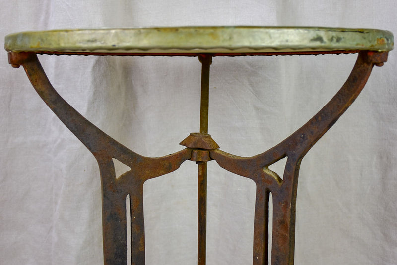 Antique French bistro table with marble top and cast iron base