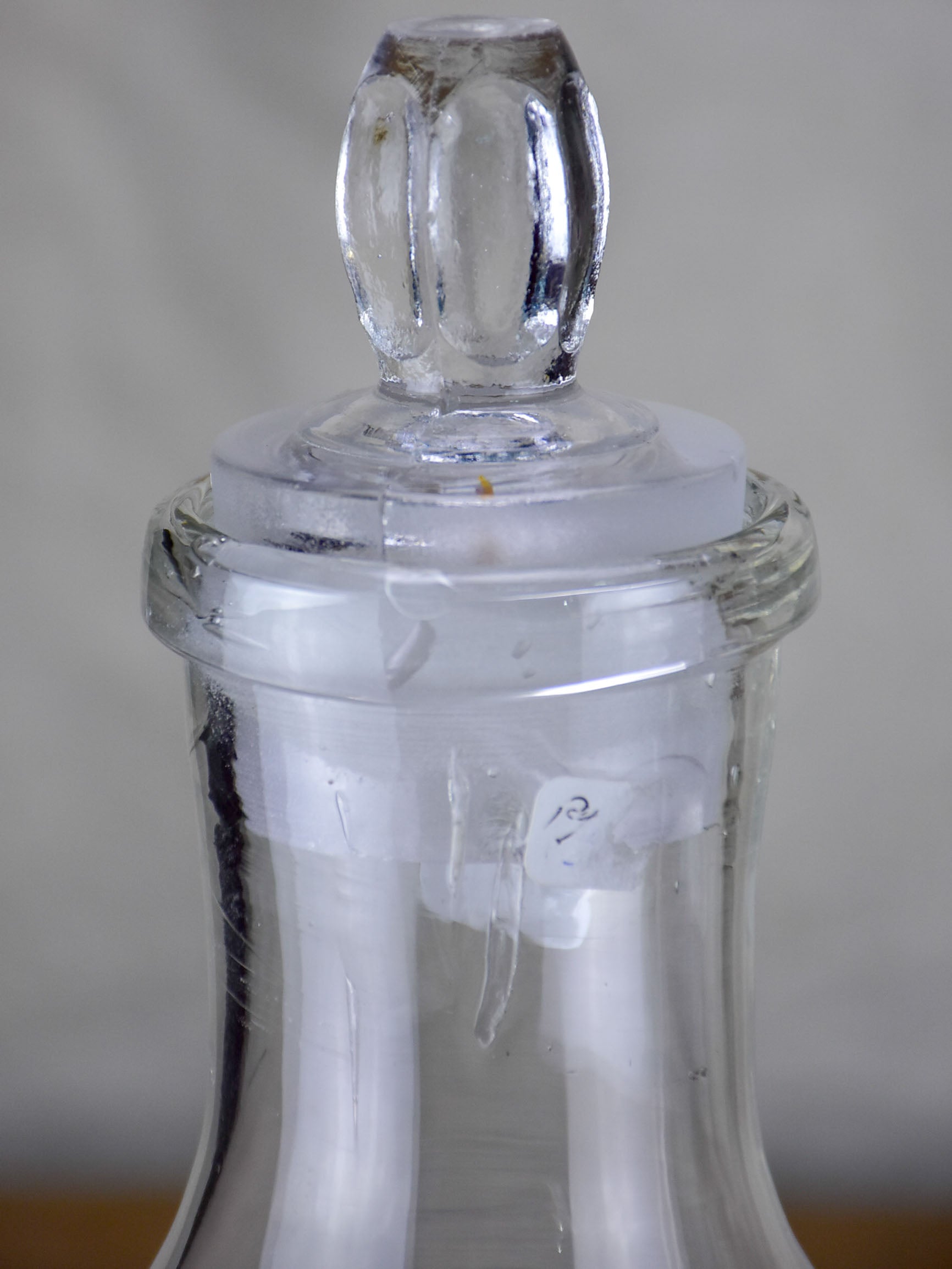 Two antique French glass apothecary bottles
