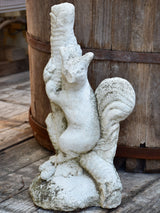 Vintage garden sculpture of a squirrel