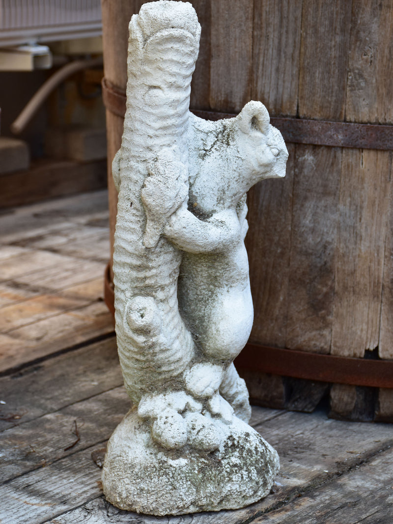 Vintage garden sculpture of a squirrel