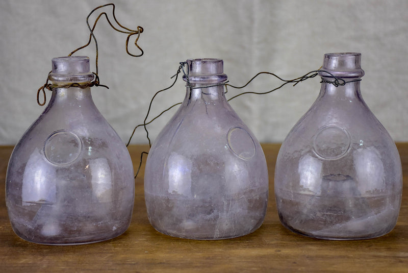 Three antique French flytrap bottles purple tinge Chez Pluie