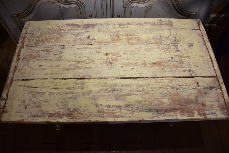Chunky and rustic Swiss table with white patina