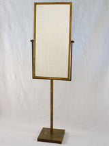 Tilting rectangular shop mirror from the 1900s. 43¾"
