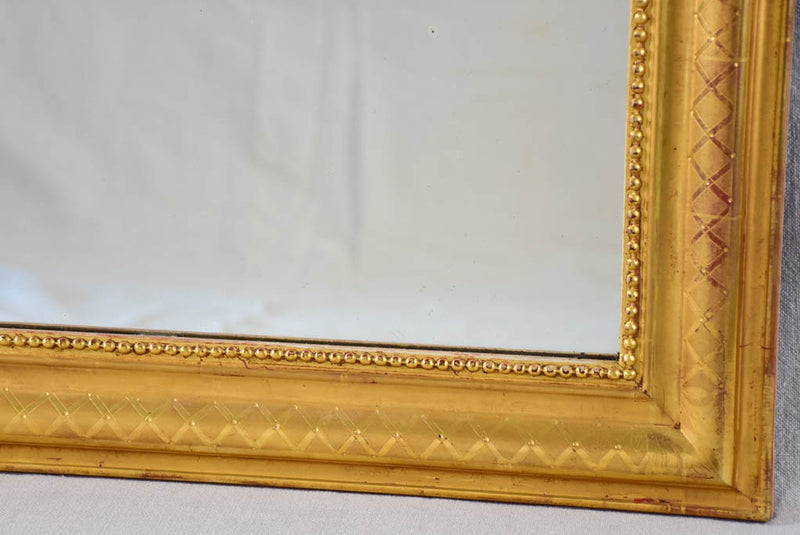 19th century Louis Philippe mirror with gilt frame and running pearl 26¾" x 35½"