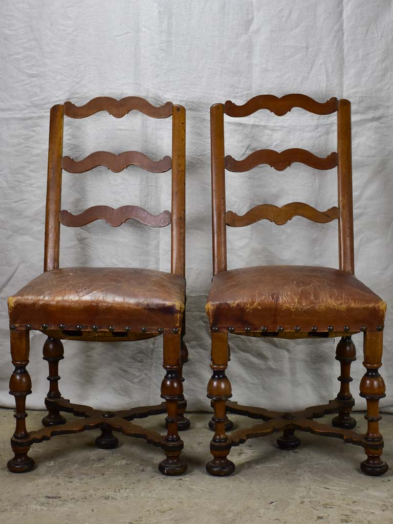 Pair of 17th Century Swiss walnut and leather chairs