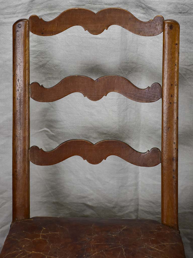 Pair of 17th Century Swiss walnut and leather chairs