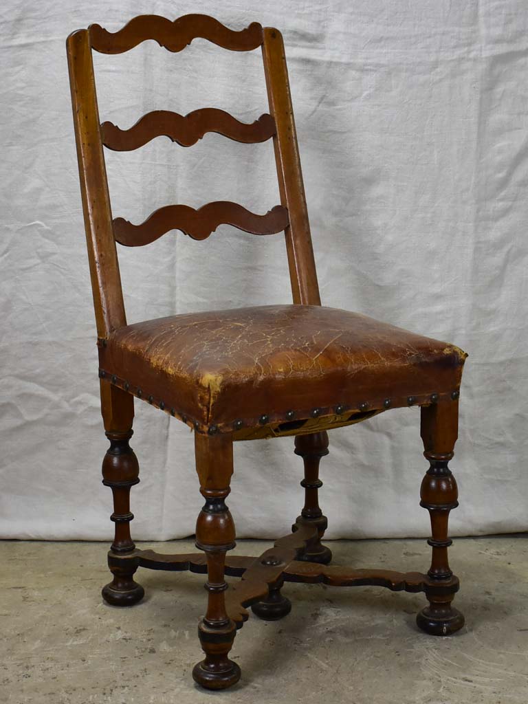 Pair of 17th Century Swiss walnut and leather chairs